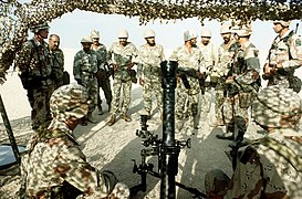 A member of the 1st Battalion, 325th Airborne Infantry Regiment, explains the M252 81mm mortar to Saudi Arabian national guardsmen.JPEG