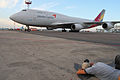 Asiana 747-400BCF and a planespotter at DME 30-Jul-2011.jpg