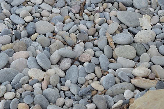 Beach pebbles formed over time as the ocean water washes over rocks