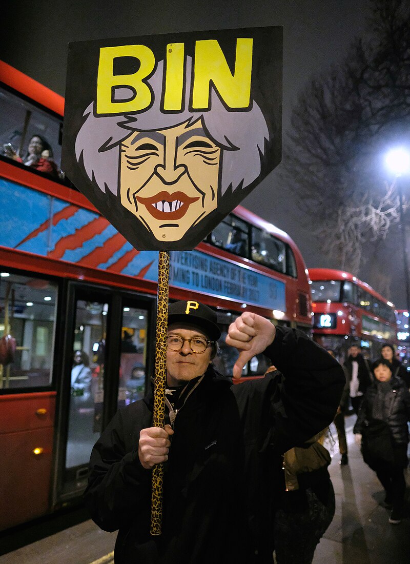 Bin Theresa May - Demonstrator at a Whitehall bus stop during London's anti-Trump rally. (32643345095).jpg