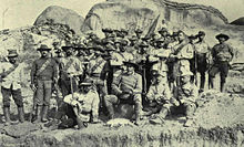 H Troop of the Bulawayo Field Force, commanded by Frederick Courteney Selous (front, seated), c. 1893 Bulawayo-H-Troop-Selous.jpg