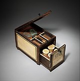 Cosmetic Box of the Royal Butler Kemeni; 1814–1805 BC; cedar with ebony, ivory veneer and silver mounting; height: 20.3 cm (8 in); Metropolitan Museum of Art (New York City)