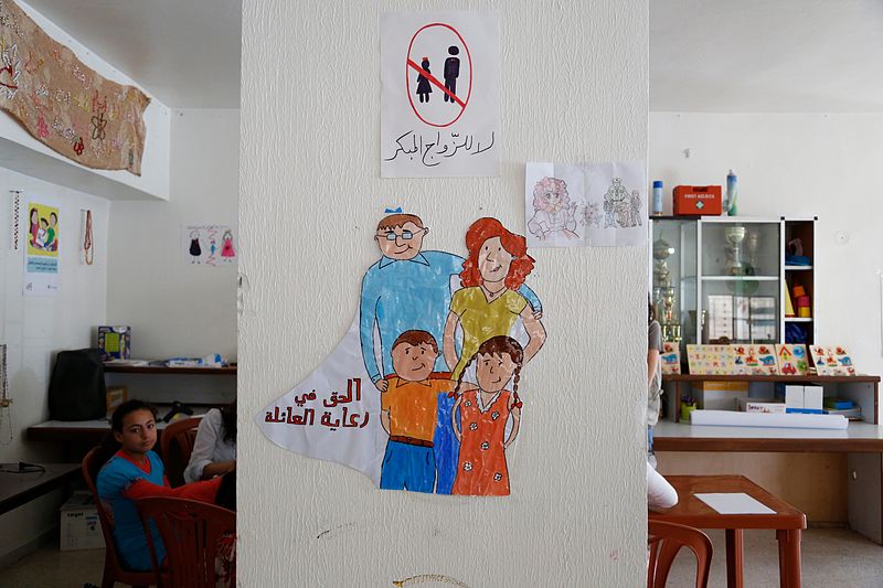 File:Drawings by young Syrian refugee girls in a community centre in southern Lebanon promote the prevention of child marriage. (14496389777).jpg