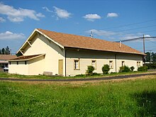 The rear with shed and triangular knee braces under the eaves Dundee Womens Club Hall rear - Dundee Oregon.jpg