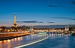 Eiffel Tower and Pont Alexandre III at night.jpg