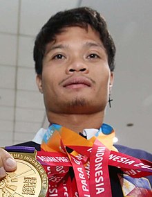 Ernie Gawilan Asian Games 2018 medals (cropped).jpg