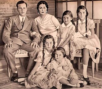 Farouk of Egypt with his mother and sisters, 1938.