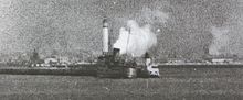 Fenella comes under air attack, whilst berthed alongside the East Mole at Dunkirk, 29 May 1940. Fenella at the East Mole, Dunkirk..jpeg