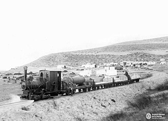 Krauss 0-4-0T locomotive with freight train near Puerto Pirámides