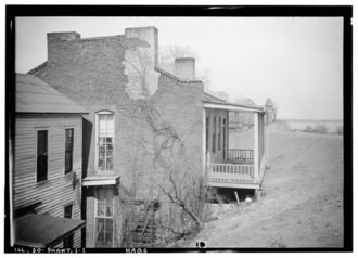 1934 photograph of the original 19th century house HISTORIC AMERICAN BUILDINGS SURVEY CHAUNCEY BUCK - PHOTOGRAPHER - MARCH 14, 1934 VIEW FROM SOUTH - John Marshall House, Shawneetown, Gallatin County, IL HABS ILL,30-SHAWT,1-1.tif