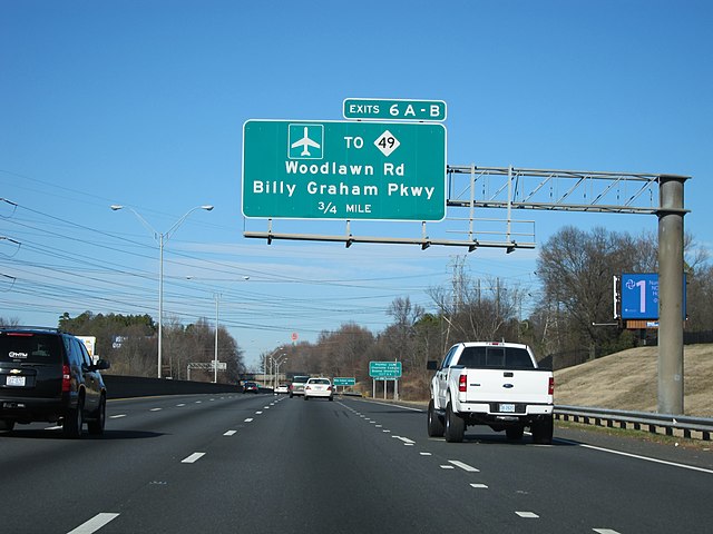 Woodlawn Road and Billy Graham Parkway overhead sign in Charlotte, North Carolina