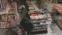 CCTV image of people in the IV Deli Mart running for cover as Rodger fired into it Isla Vista shooting CCTV footage.jpg