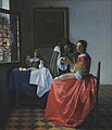 Johannes Vermeer, Dame en twee heren, ca. 1660