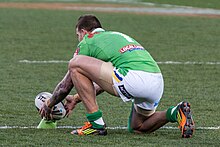 Dugan kicking for goal for Canberra in 2012 Josh Dugan Canberra.jpg