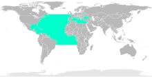 A global map showing the distribution of the little tunny: a solid bar exists across much of the Atlantic ocean (from Novia Scotia to southern England in the North and from Brazil to Angola in the south)