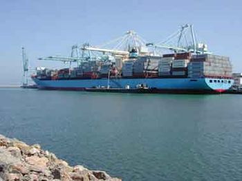 Liberalization of trade policies and globalization of supply chains have contributed to growth in the volume of freight moving through U.S. facilities, such as the port at Long Beach, CA, where this vessel is arriving (November 2004).