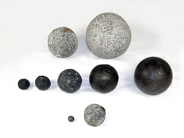 Round shot from the 16th century Mary Rose English warship, showing both stone and iron ball shot