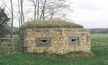 A World War II hexagonal pillbox on the bank of the Mells River at Lullington, Somerset, England Moon and pillbox - geograph.org.uk - 325948 crop.jpg