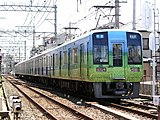 1001F なんばパークスラッピング （2006年7月 住吉東駅付近）