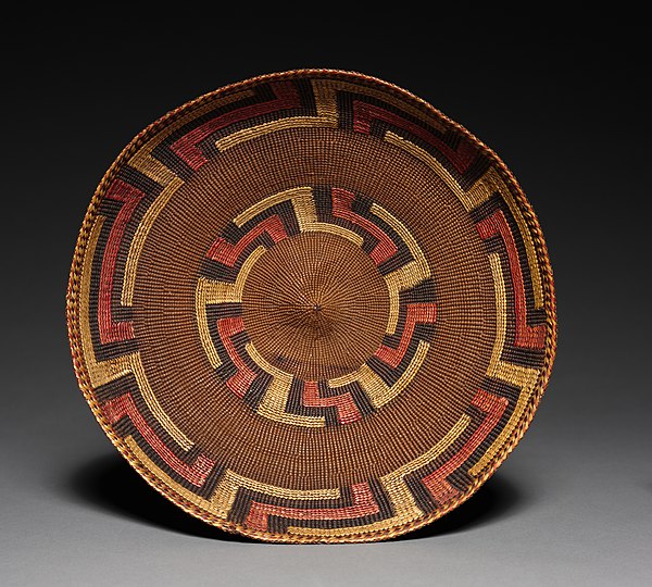 Tlingit twined basket tray, late 19th c., spruce root, American dunegrass, pigment, Cleveland Museum of Art