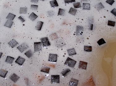 Chardonnay fermenting. Oak chips in chardonnay.jpg