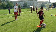 Aspiranti calciatori durante un Milan Junior Camp a Kiev