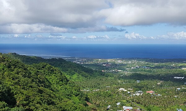 Pago Pago International Airport, as seen from A'oloau facing south, is on the left-hand side along the water.