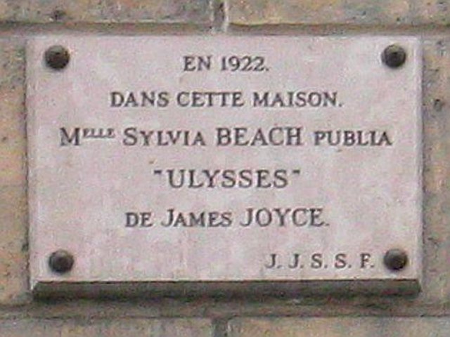 Plaque at 12 Rue de l'Odéon, Paris VI, which reads "In 1922, in this house, Mlle. Sylvia Beach published Ulysses by James Joyce."