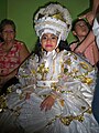 Entre los personajes más icónicos de la celebración de Corpus Christi en Suchiapa, se encuentra la "Reinita", es el único infante danzante junto al Gigantillo. Las reinitas son dos niñas que bailan siempre junto a sus ayudantes Malanches, ellas tienen su propia ruta de baile independiente a la de los otros danzantes. Suchiapa, Chiapas, México, 2017. Cortesía de Mariela TC.