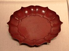 A Chinese six-pointed tray, red lacquer over wood, from the Song dynasty (960-1279), 12th-13th century, Metropolitan Museum of Art. Red lacquer tray, Song Dynasty.jpg