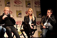 Scott speaking with Prometheus stars Charlize Theron and Michael Fassbender at Wondercon 2012 in Anaheim, California on 17 March 2012 Ridley Scott, Charlize Theron & Michael Fassbender by Gage Skidmore.jpg
