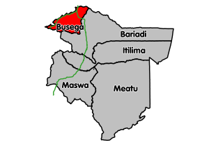 Busega District's location within Simiyu Region. Paved trunk roads in green.