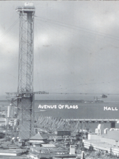 Closeup of inland tower, showing 200 ft landing and observation deck at top. A "rocket car" is visible at right Sky RideTower.png