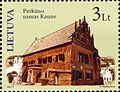 Poštovní známka s domem.