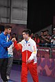 Deutsch: Tischtennis bei den Olympischen Jugend-Sommerspielen 2018: Tag 4, 10. Oktober 2018, Jungen-Einzel, Siegerehrung - Gold: Wang Chuqin (CHN), Silber: Tomokazu Harimoto (JPN), Bronze: Kanak Jha (USA); Medaillen überreicht durch IOC-Mitglied William Frederick Blick (UGA), Maskottchen überreicht durch ITTF-Präsident Thomas Weickert (GER) English: Fencing at the 2018 Summer Youth Olympics at 10 October 2018 –Boys' single medail ceremony – Gold: Wang Chuqin (CHN), Silber: Tomokazu Harimoto (JPN), Bronze: Kanak Jha (USA)); Medal presenter: IOC member William Frederick Blick (UGA), Mascot presenter: ITTF President Thomas Weickert (GER)