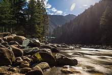 The Moonlit Parvati River flowing beside Kasol Town, Himachal Pradesh