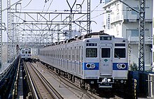 6000 series between Shin-Takashimadaira and Nishi-Takashimadaira, February 1999 Toei6121 2.jpg