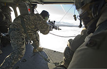 Aerial platform shooting training U.S. Army Sgt. Chuck Riegel, left, assigned to the 1st Battalion, 501st Parachute Infantry Regiment, 4th Infantry Brigade Combat Team, 25th Infantry Division, U.S. Army Alaska, engages a target with an M107 140307-F-LX370-566.jpg