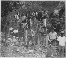 U.S. Marines in search of Cacos, c. 1919 U.S. Marines and guide in search of bandits. Haiti, circa 1919., 1927 - 1981 - NARA - 532584.tif