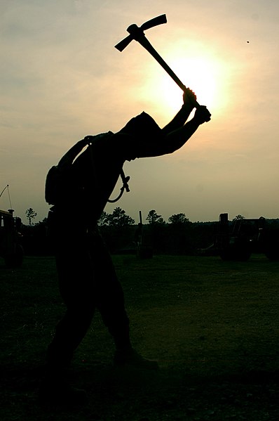 File:US Navy 070614-N-7367K-005 Steelworker 3rd Class James Branstietter, a Seabee attached to Naval Mobile Construction Battalion (NMCB) 1, digs a trench for WD-1 wire.jpg