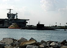 Tikuna arriving at the U.S. naval base in Mayport, Florida with the aircraft carrier USS John F. Kennedy US Navy 070720-N-5677B-005 Brazilian Navy submarine Tikuna (S 34) enters Mayport Basin during her first visit to a U.S. Navy base, sponsored by U.S. Naval Forces Southern Command (NAVSO).jpg