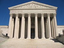 Institutions are often the framework within which politics happens. Pictured is the Supreme Court of the United States. US Supreme Court.JPG