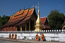 Teams began their leg in Luang Prabang at Wat Sensoukharam by giving alms of rice to monks. WatSen.jpg