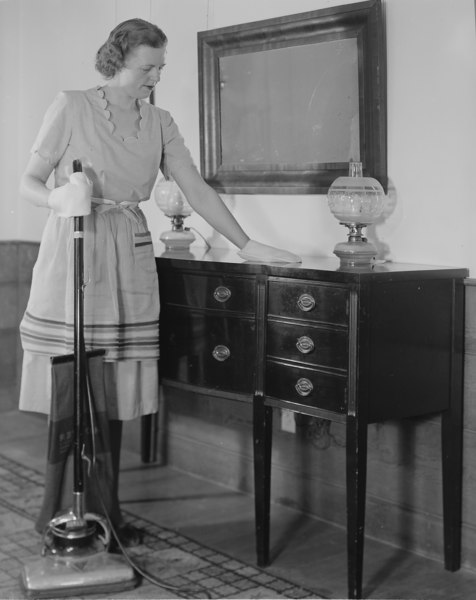 File:Woman dusting and using a vacuum.tif