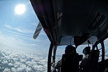 Cabin view, looking out a UH-72 (2015) 150610-Z-II459-007 (18562070050).jpg