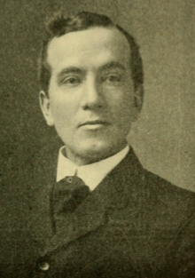 Black and white headshot of Joseph H. Soliday around the age of 39, he is wearing a suite and tie