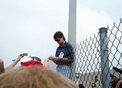 Gordon signing autographs for fans at the Open Test at the Indianapolis Motor Speedway in 1993. 1993BrickyardtestJeffGordon.jpg