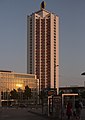 * Nomination View on the Wintergartenhochhaus from a bus stop at the Leipzig main train station during the golden hour. --DavidJRasp 09:17, 23 September 2020 (UTC) * Decline nice colors. But I think it is cropped to much at the top --Augustgeyler 09:31, 23 September 2020 (UTC)  Oppose Sorry, but I think crop is too tight on the top --Halavar 09:32, 23 September 2020 (UTC)