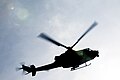 CAMP HANSEN, Okinawa, Japan (March 28, 2020) A UH-1Y Venom helicopter with Marine Medium Tiltrotor Squadron (VMM) 265 (Reinforced), 31st Marine Expeditionary Unit (MEU), takes off after conducting a forward arming and refueling point (FARP) exercise. During the evolution, the MEU's Combined Anti-Armor Team conducted a ship to shore movement from amphibious assault ship USS America (LHA 6) before securing a landing zone for the FARP. America, flagship of the America Expeditionary Strike Group, 31st MEU team, is operating in the U.S. 7th fleet area of operations to enhance interoperability with allies and partners and serve as a ready response force to defend peace and stability in the Indo Pacific region. (U.S. Marine Corps photo by Lance Cpl. Kenny Nunez Bigay)