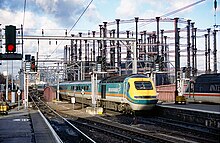 43056 in Midland Mainline livery passing the gasworks, St Pancras, 1998 43056 at St Pancras.jpg